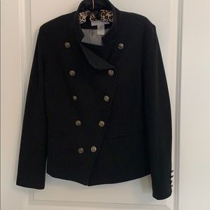 Women’s black blazer button up.